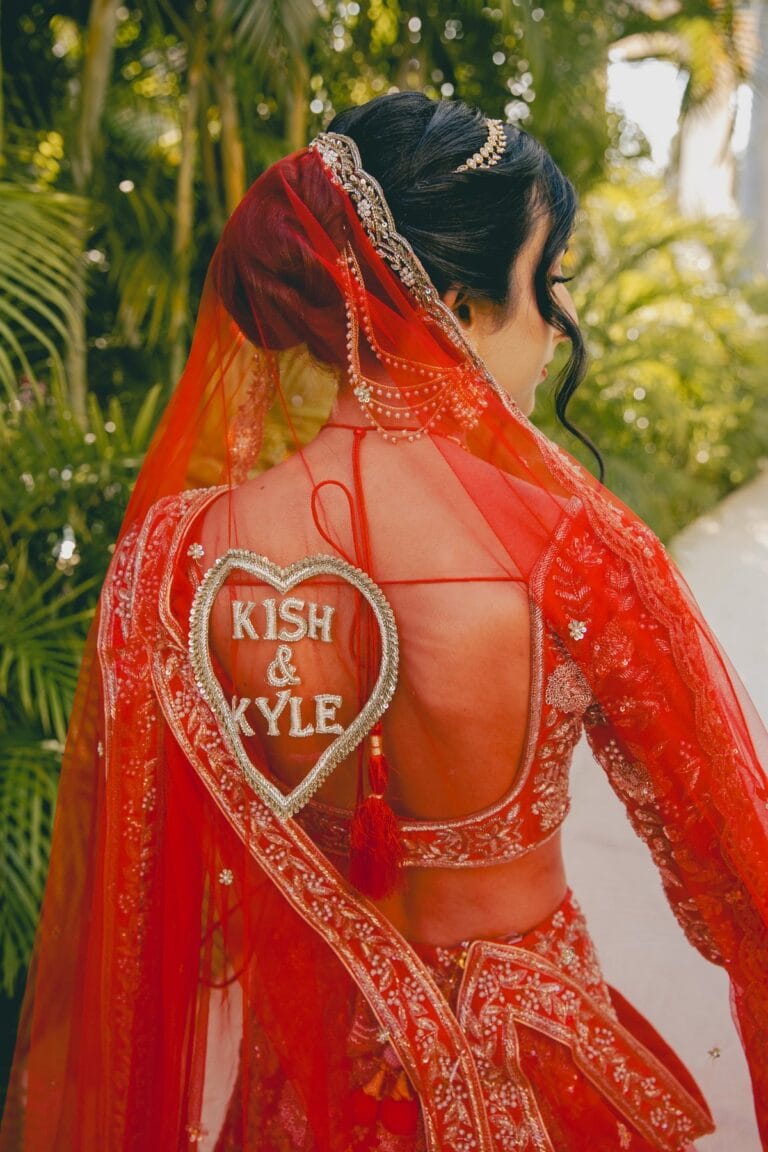 The back of Kishory’s bridal outfit with a heart-shaped Kish and Kyle detail.