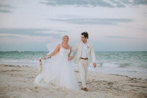 Lindsey and Luciano walking beside the sea